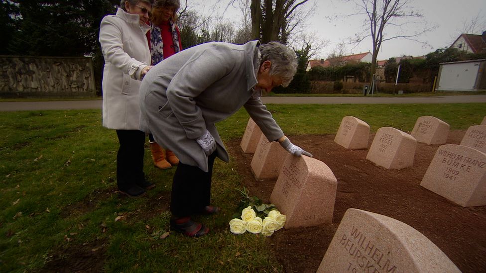 Mrs Harris at father's graveside