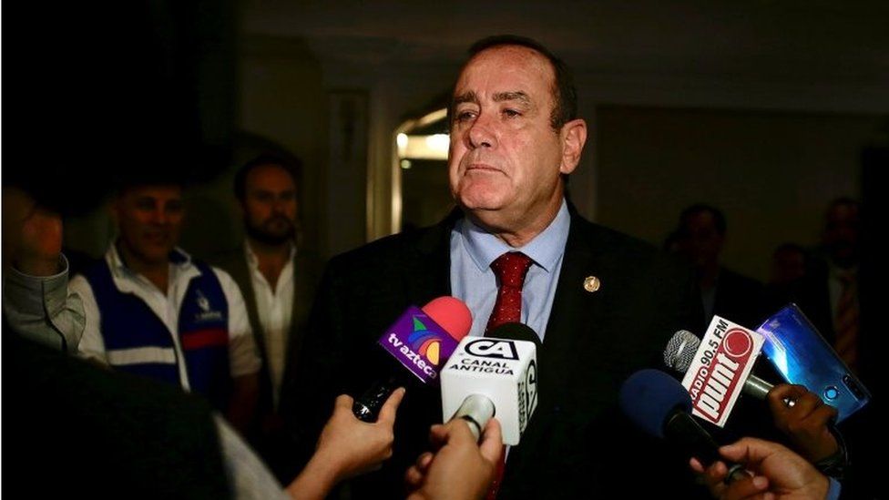 Presidential candidate Alejandro Giammattei speaks to reporters after a news conference in Guatemala City, Guatemala June 11, 2019