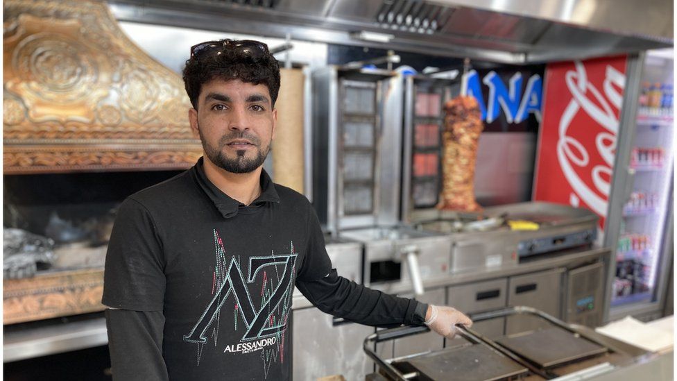 Nasir Ahmadzai behind the counter at Rotana Grill House