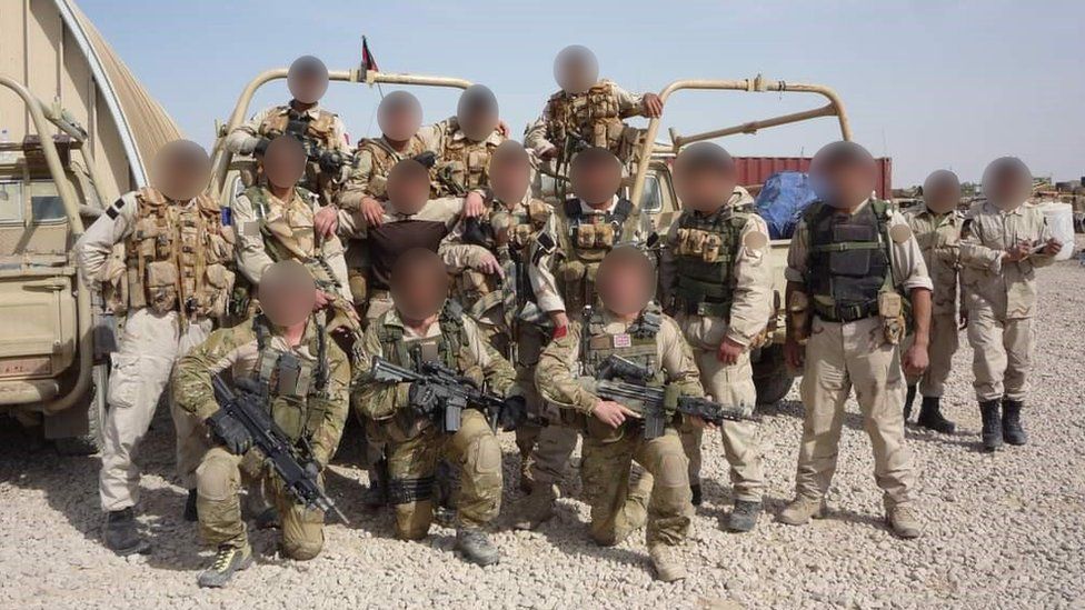 A group photo of CF333 soldiers and British special forces soldiers, with faces blurred