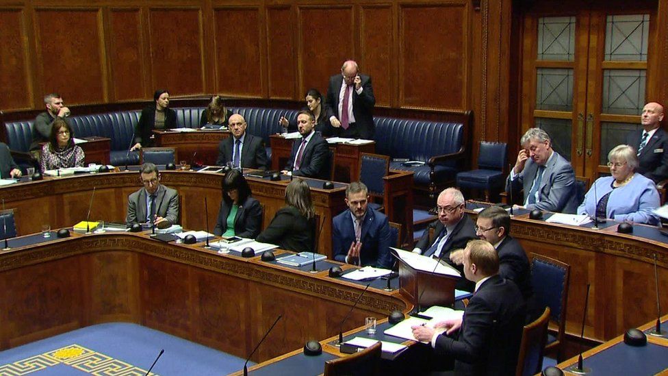 Politicians sitting in NI Assembly chamber