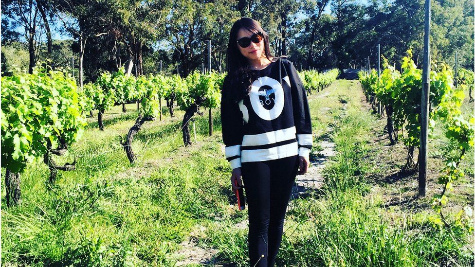 Rika Wenjing in a vineyard