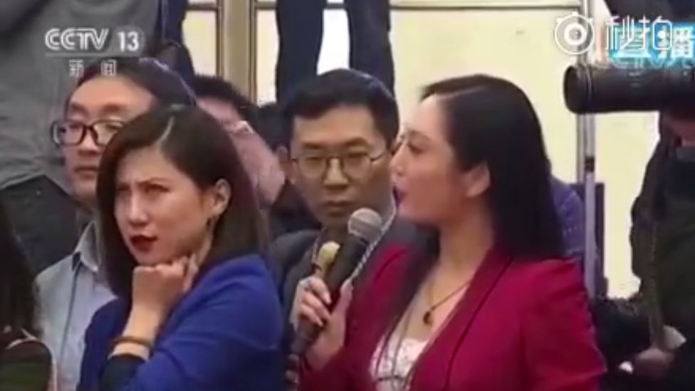 Eye roll by a female journalist captured on a video circulating on Weibo