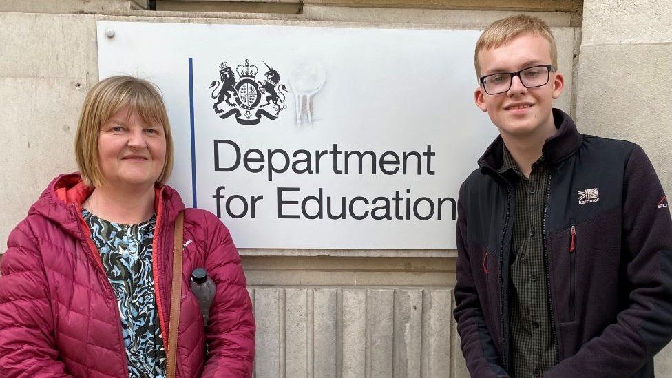 Ann and David Jillings standing outside Department for Education in London.