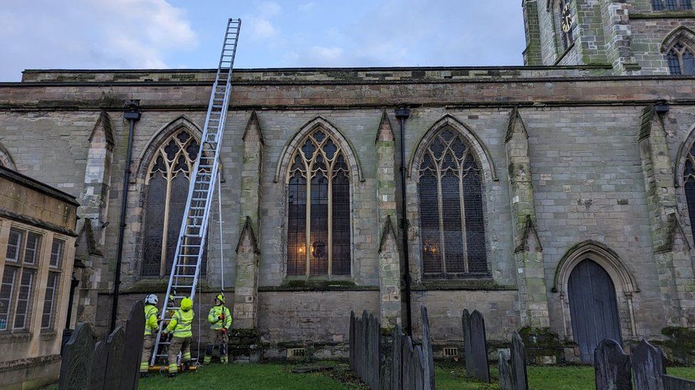 Firefighters at church