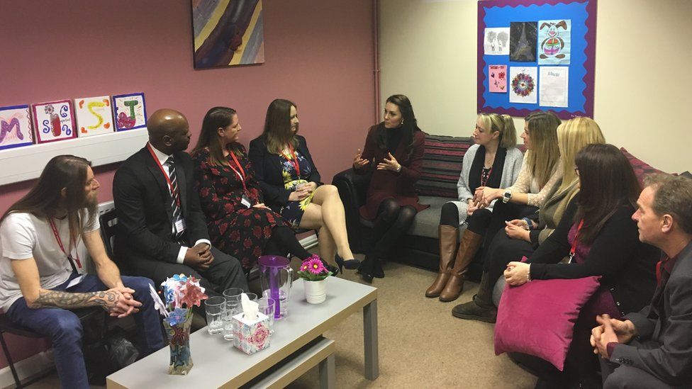 Duchess talks to parents and foster carers