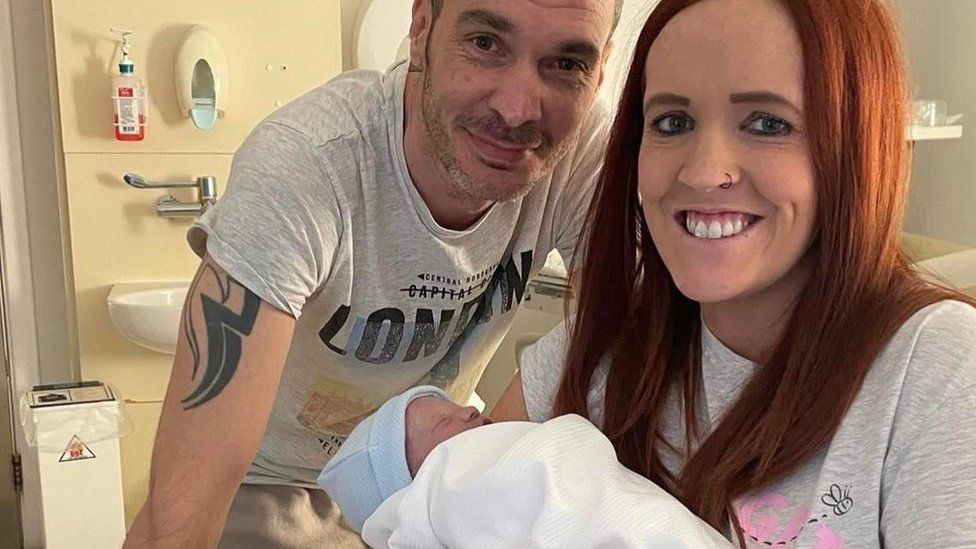 Kimberley Harney and husband Scott with baby Zak