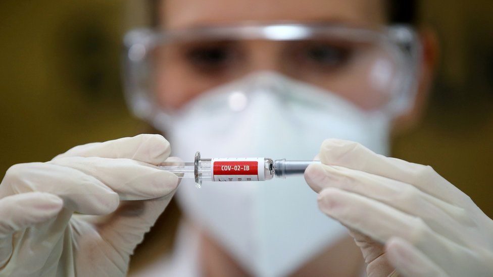A nurse holds China"s Sinovac vaccine, a potential vaccine for the coronavirus disease, in Porto Alegre, Brazil, in August 2020
