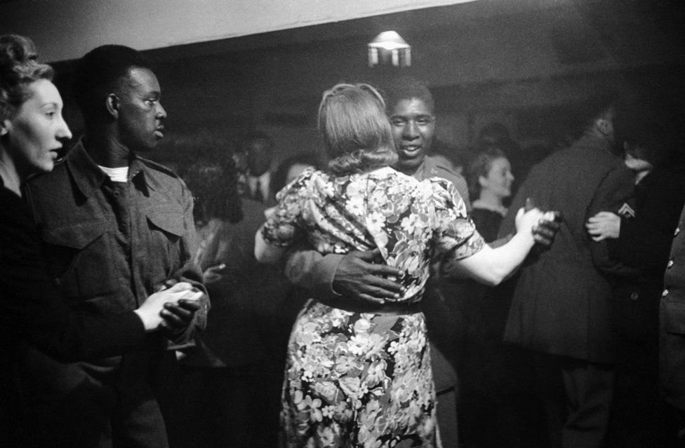 An African-American GI dancing with a white girl at the Bouillabaisse Club in London's New Compton Street, Soho, 17th July 1943