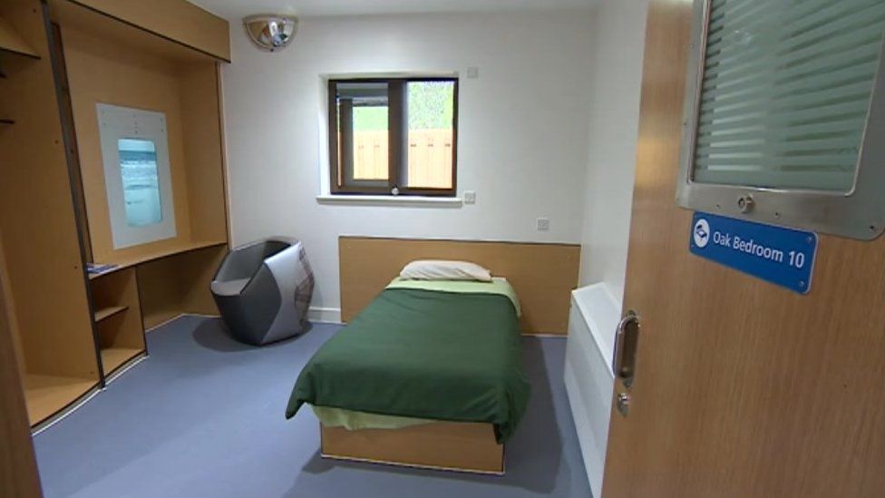 A bedroom in the new unit