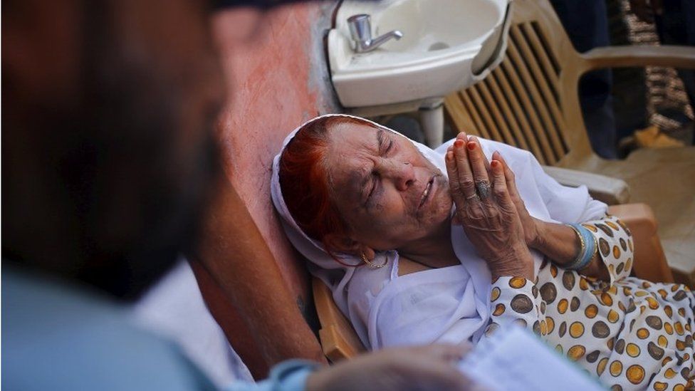 Asgari Begum, mother of Akhalaq, who was killed by a mob, mourns his death inside her house at Bisara village in Uttar Pradesh, India, October 2, 2015.