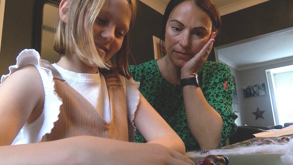 Lexi and her mum Julie working on maths homework together