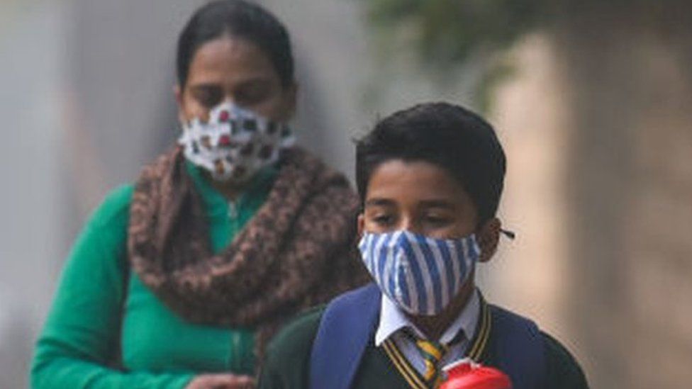 NEW DELHI, INDIA - NOVEMBER 29: Students arrive at Sarvodaya Co-Ed Senior Secondary School at Safdarjung as it reopens today after remaining closed for over two weeks due to hazardous air quality levels, on November 29, 2021 in New Delhi, India. (Photo by Amal KS/Hindustan Times via Getty Images)