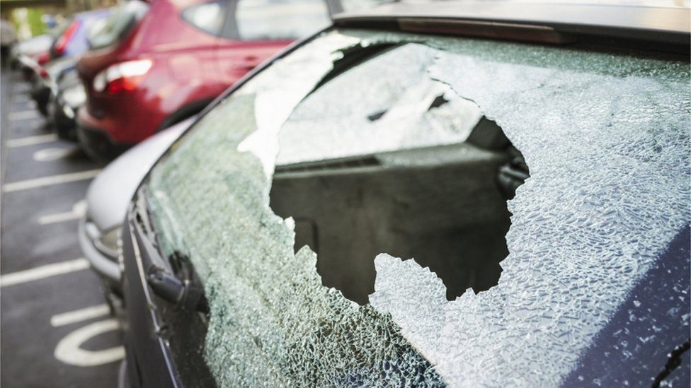 Broken glass / shattered car windscreen, after a vehicle was broken into.
