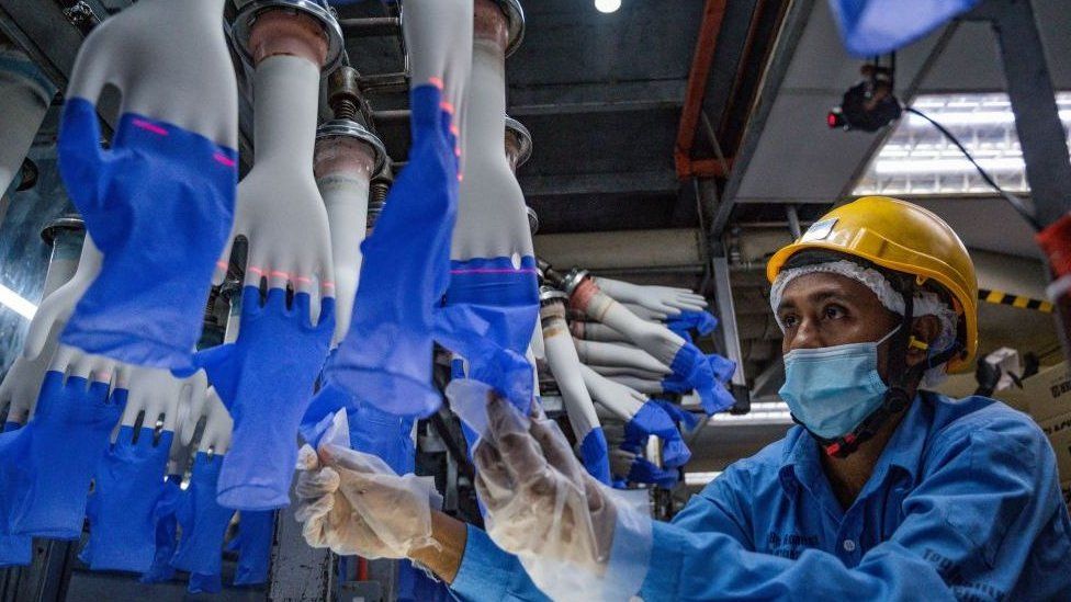 Worker in Top Glove factory in Malaysia