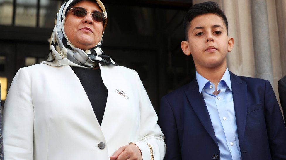 Fatima Boudchar, wife of Libyan politician Abdul Hakim Belhadj, and their son Abderrahim