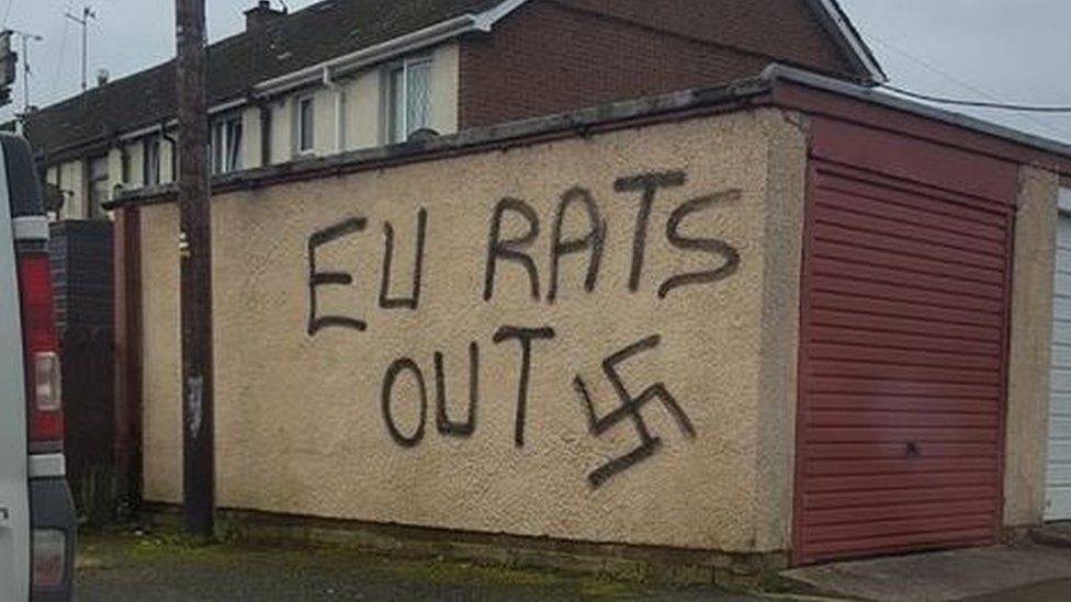Graffiti on wall at Seapatrick Avenue which says "EU Rats out"