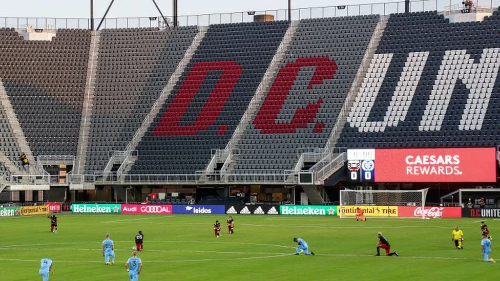 DC United: US sports trainer fired for 'discriminatory' hand gesture