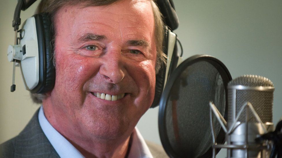 Sir Terry Wogan taking part in a charity recording