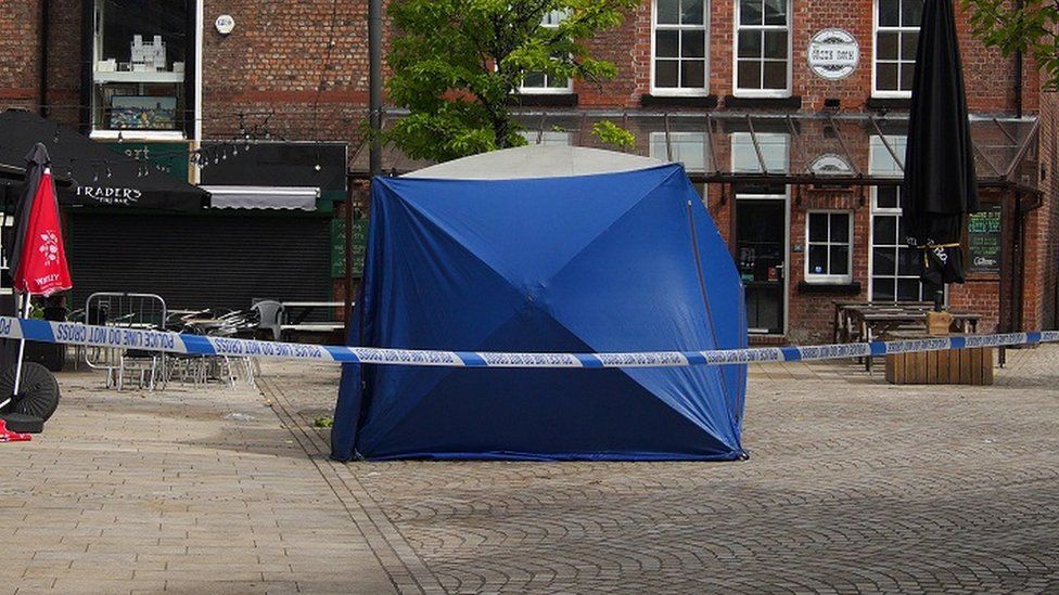 Police tent at the scene on Railway Street in Altrincham