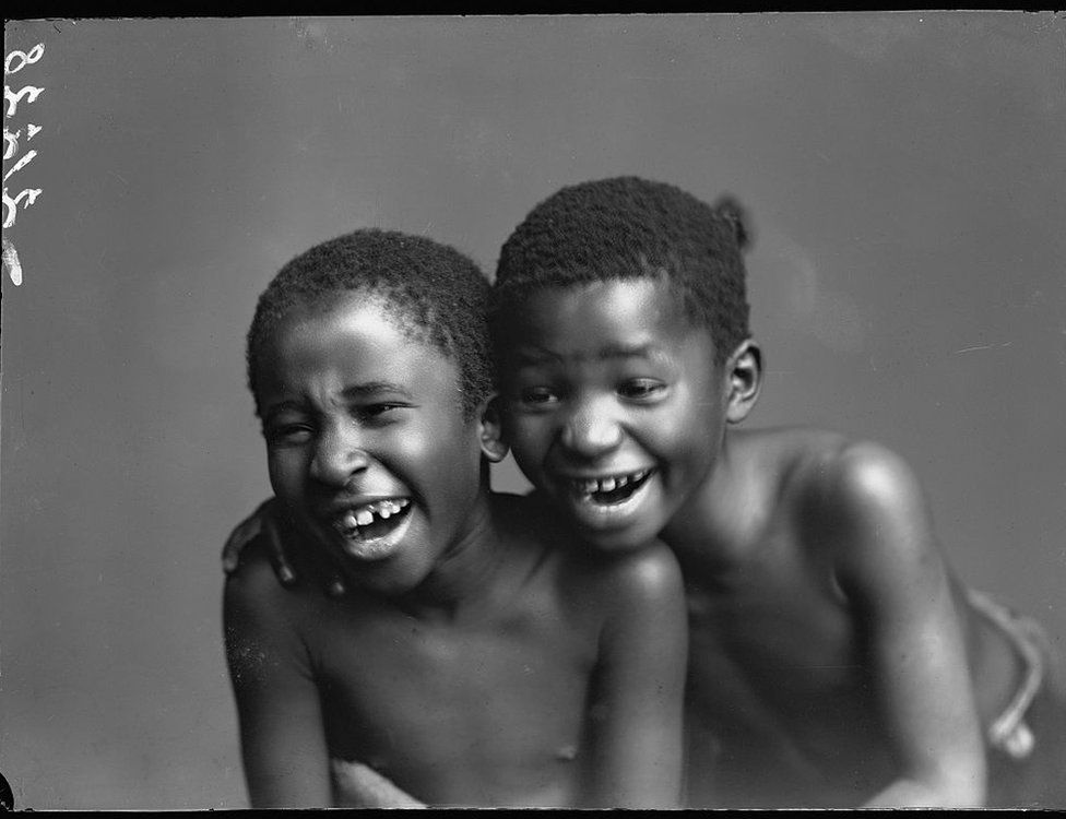 Two young boys smiling