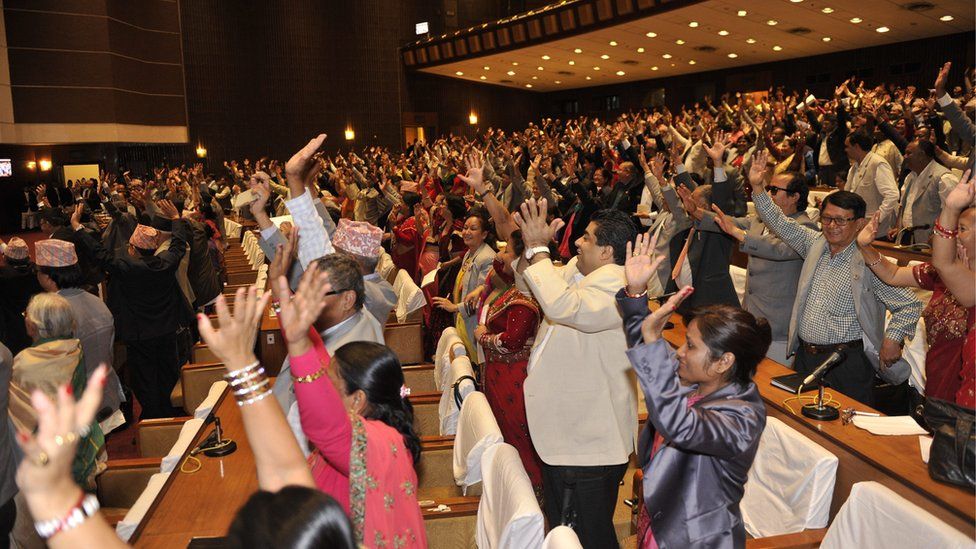Nepalese MPs cheers as the vote is passed (16 Sept 2015)