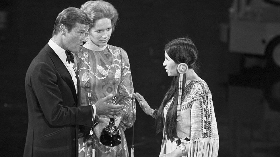 At the 1973 Academy Awards, Sacheen Littlefeather refuses the Academy Award for Best Actor connected  behalf of Marlon Brando who won for his relation   successful  The Godfather.