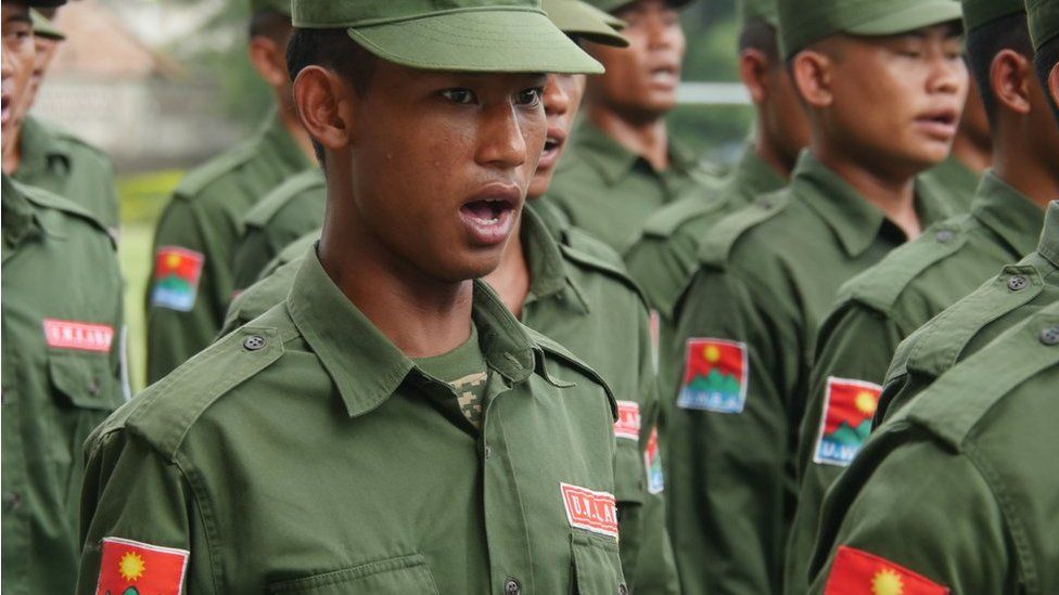 Wa state soldiers, in formation and uniform.