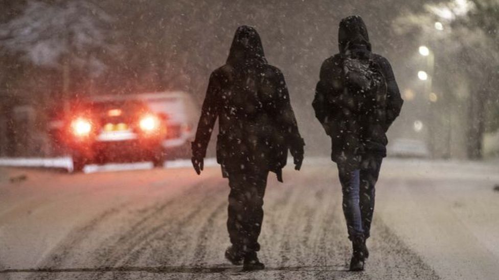 People walking in the snow