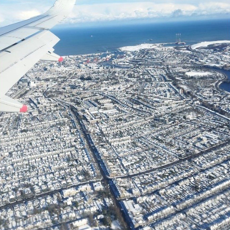 Snow-covered Aberdeen from the air