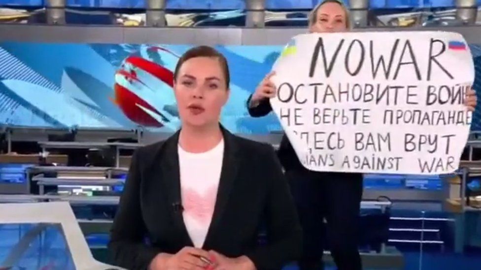 Protester on set of the Vremya news programme