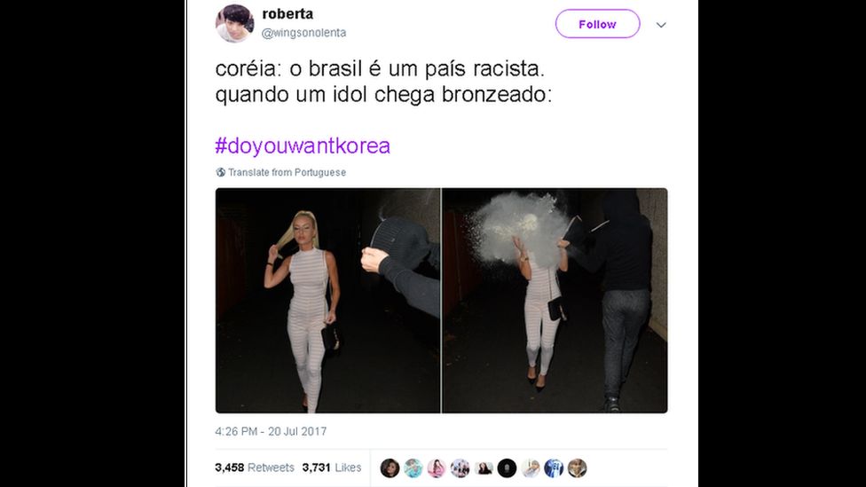A picture of a woman getting a bucket of white paint dumped on her. The caption, in Portuguese, says: 'Korea: Brazil is a racist country. [But] when a celebrity who is tanned visits Korea ... '.