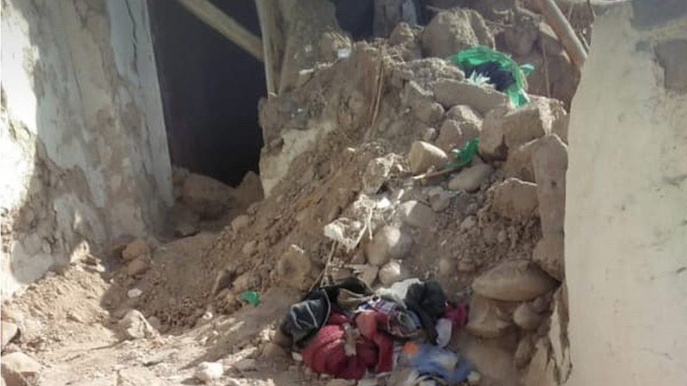 Rubble piled up outside a home in Morocco