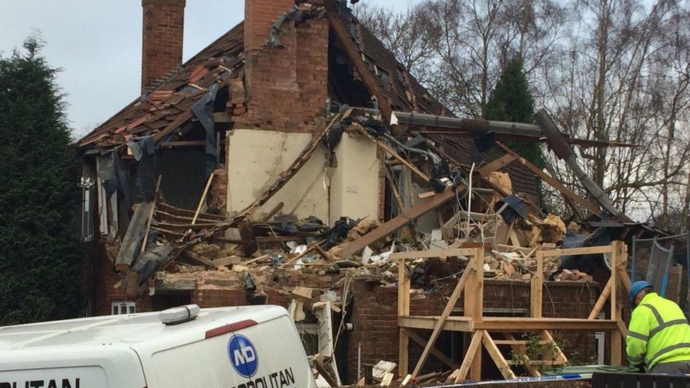 Remains of flat destroyed in explosion demolished - BBC News