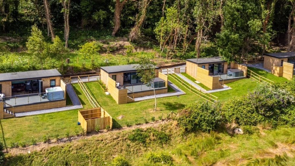 Swansea Council orders demolition of luxury holiday cabins BBC News