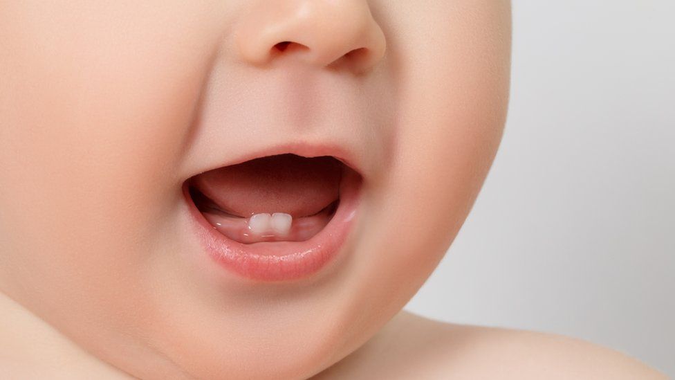 Close-up of a baby's open mouth