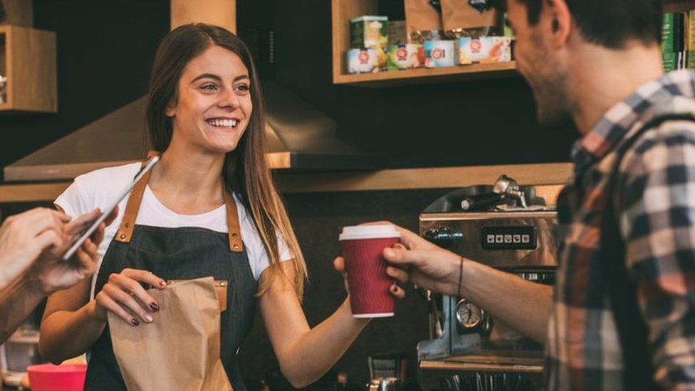 Staff serving coffee