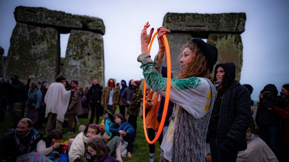 People inside the stone-circle during Summer Solstice at Stonehenge