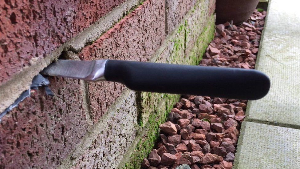 Knife sticking out of mortar