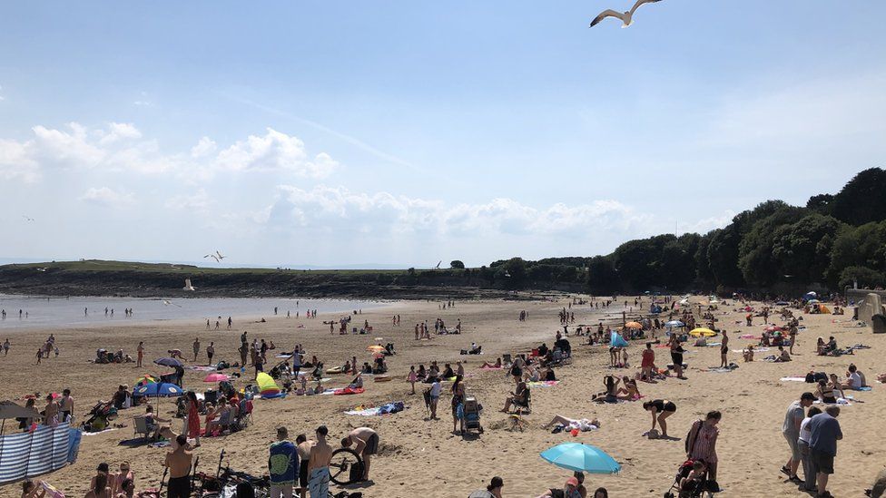 People flocked to the beach in Barry, Vale of Glamorgan, on Thursday