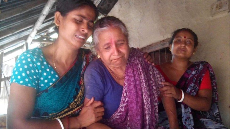 Relatives console Shefali Ganguly (C) wife of the Hindu priest Anando Gopal Ganguly (70) who has been hacked to death by suspected militants near Sonakhali canal in Jhenidah in Bangladesh 07 June 2016.