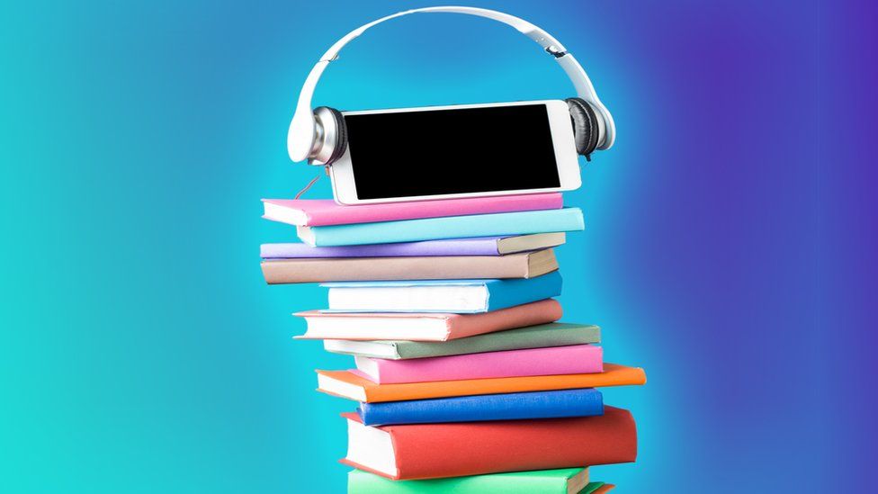 Pile-books-ipad-headphones-top.