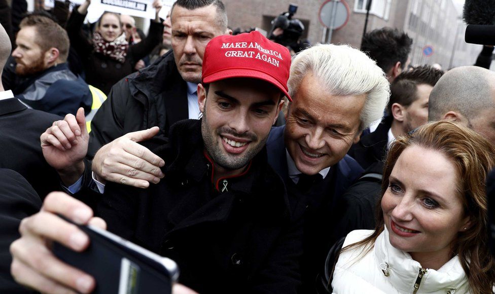 Dutch politician and leader of the Party for Freedom (PVV) Geert Wilders joins with members of the public to be photographed together in the center of Spijkenisse, The Netherlands, 18 February 2017