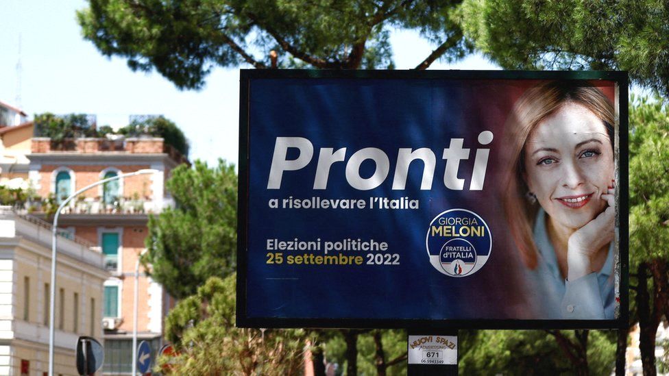 An election campaign poster of the leader of far-right party Fratelli d'Italia, Giorgia Meloni, is displayed in Rome