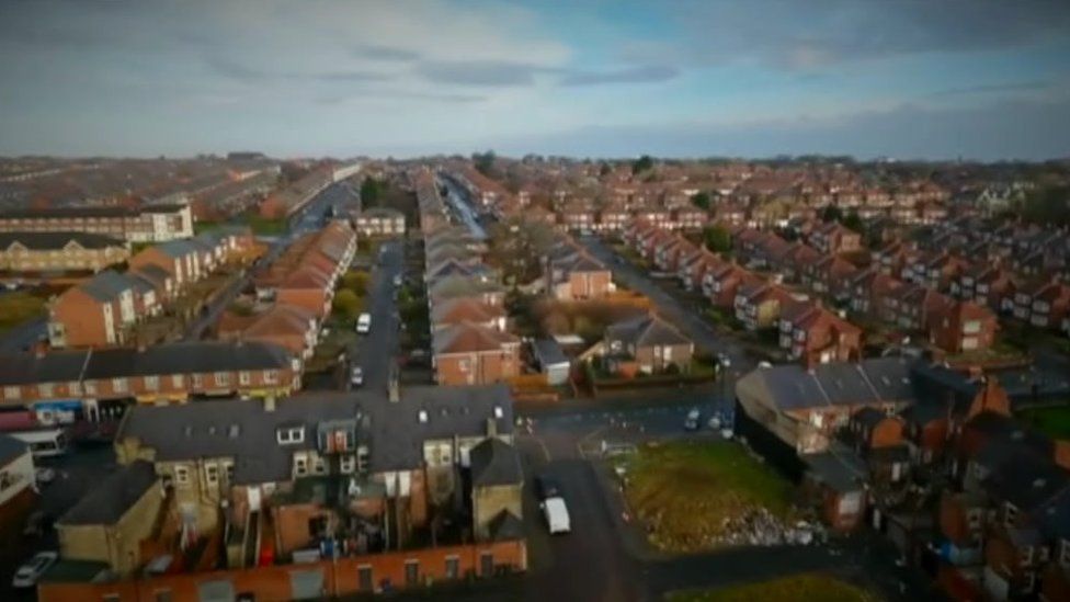 Aerial view of rows of houses