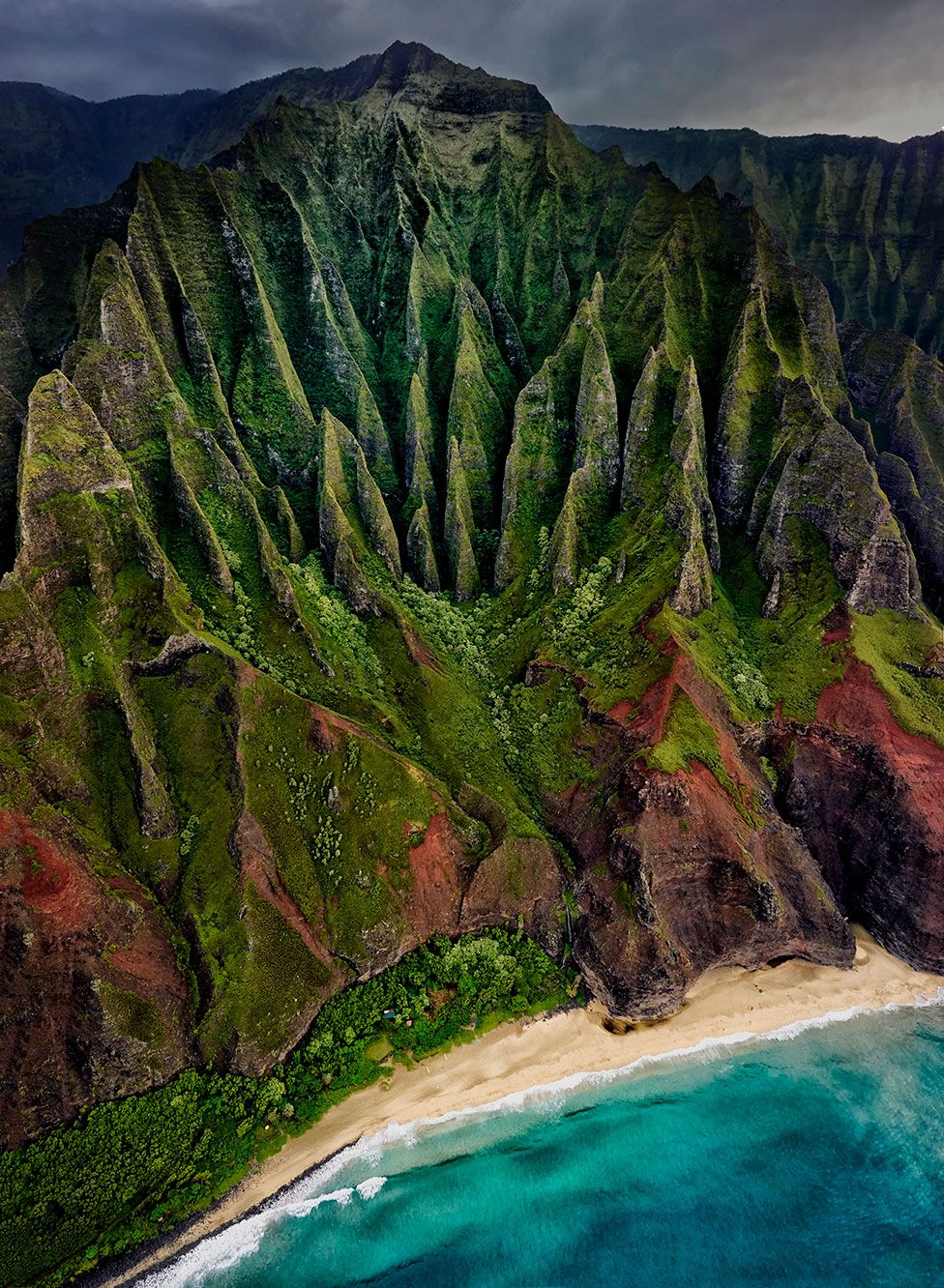An aerial view of a mountainous coast in Kauai Island, Hawaii, US