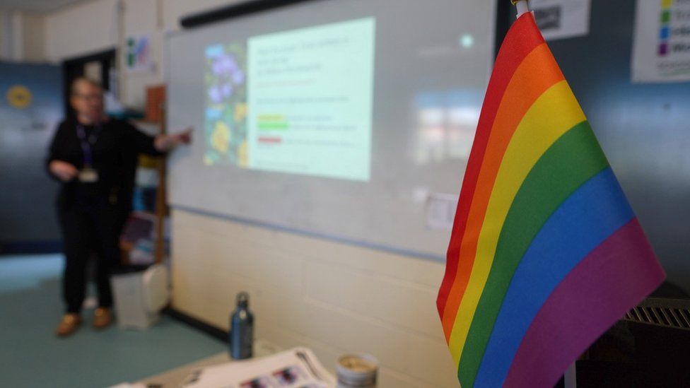 Rainbow flag on teacher's desk