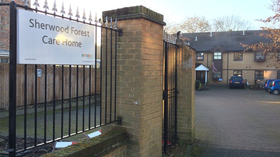 Man caught fire outside care home 'due to smoking materials' BBC News