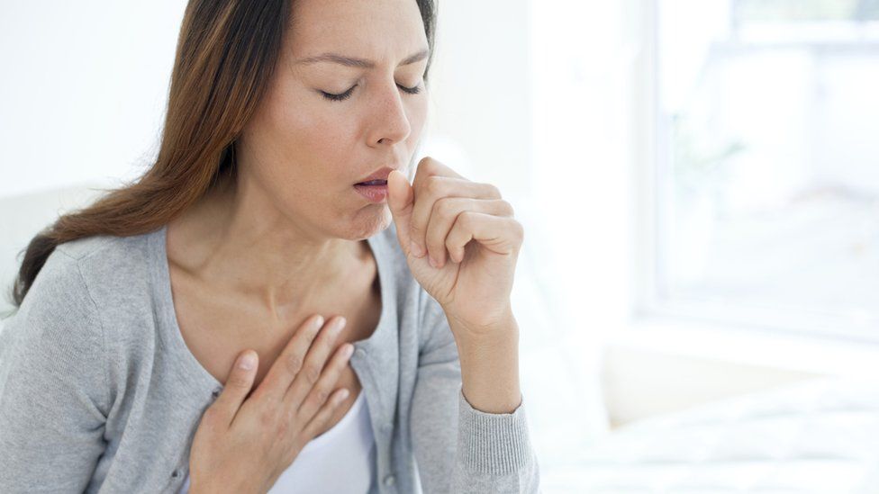 woman coughing