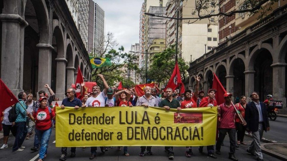 Protesters linked to the Landless Workers Movement (MST) and Via Campesina march in Porto Alegre, southern Brazil, in defence of democracy and the right of former president Luiz Inacio Lula da Silva to be a candidate in the next national elections, on January 22, 2018.